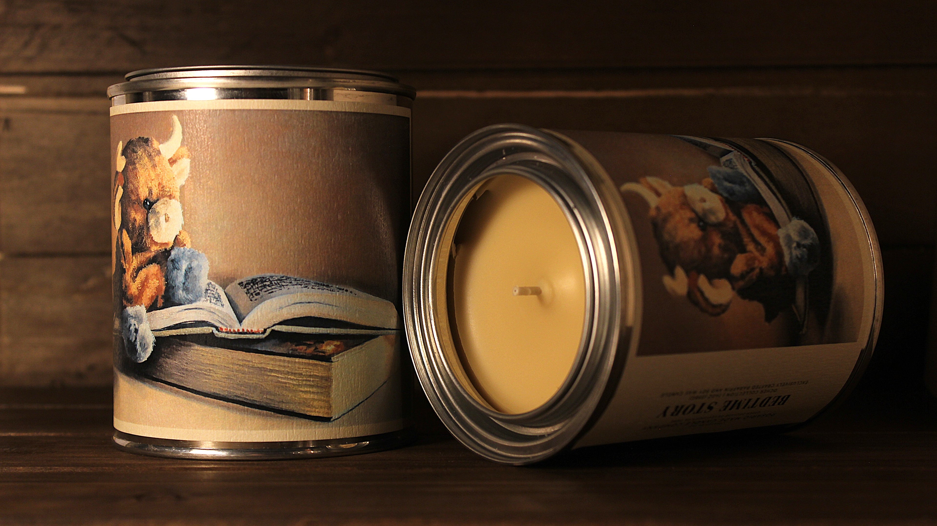 Candle in a decorative tin with a teddy bear and book design soy wax